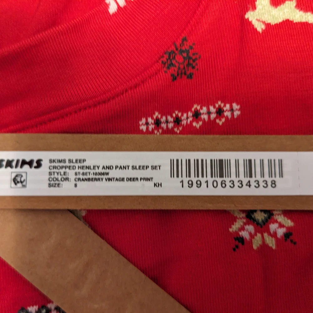SKIMS Cropped Long Sleeved Holiday Cranberry Pajama Set - Picture 4 of 11